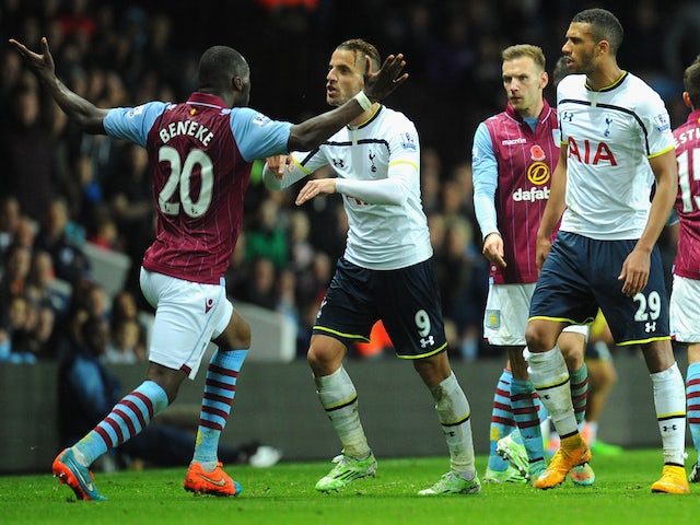 Villa player Christian Benteke (l) confronts Roberto Soldado of Spurs before being sent off during the Barclays Premier League match on November 2, 2014