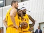 Kevin Love #0 Kyrie Irving #2 and LeBron James #23 of the Cleveland Cavaliers pose for a photo during media day at Cleveland Clinic Courts on September 26, 2014