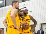 Kevin Love #0 Kyrie Irving #2 and LeBron James #23 of the Cleveland Cavaliers pose for a photo during media day at Cleveland Clinic Courts on September 26, 2014