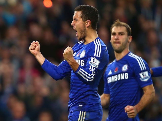 Eden Hazard of Chelsea celebrates his goal during the Barclays Premier League match between Chelsea and Queens Park Rangers at Stamford Bridge on November 1, 2014