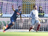 Gonzalo Higuain of Napoli celebrates after scoring the opening goal during the Serie A match between SSC Napoli and AS Roma at Stadio San Paolo on November 1, 2014