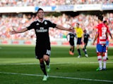 James Rodriguez of Real Madrid CF celebrates scoring their second goal during the La Liga match against Granada on November 1, 2014