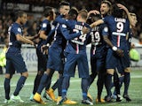 Paris Saint-Germain's Cameroonian midfielder Jean-Christophe Bahebeck (4th L) is congratulated by his teammates after scoring a goal during the French L1 football match against Lorient on November 1, 2014