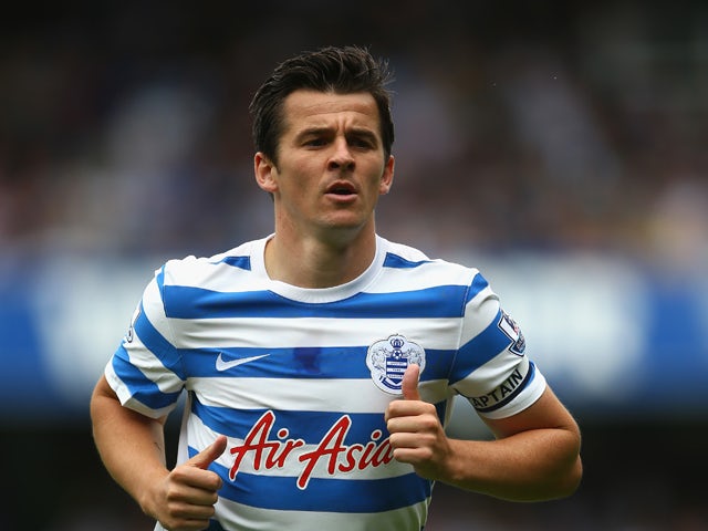 Joey Barton of Queens Park Rangers runs during the Barclays Premier League match between Queens Park Rangers and Sunderland at Loftus Road on August 30, 2014