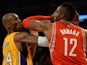 Kobe Bryant (L) of the Los Angeles Lakers and Dwight Howard (R) of the Houston Rockets clash during the Laker's first regular season NBA game, October 28, 2014