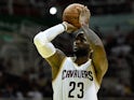 LeBron James #23 of the Cleveland Cavaliers shoots the ball against the Miami Heat at Arena HSBC on October 11, 2014 in Rio de Janeiro, Brazil