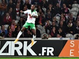 St Etienne's Ivorian forward Max Gradel celebrates after scoring a goal during the French first division L1 football match against Lille OSC on November 1, 2014
