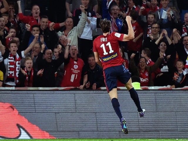 Lille's Swiss forward Michael Frey celebrates after scoring a goal during the French first division L1 football match against AS Saint-Etienne on November 1, 2014