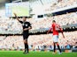 Chris Smalling of Manchester United leaves the field after receiving a red card from referee Michael Oliver during the Barclays Premier League match against Manchester City on November 2, 2014