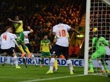 Cameron Jerome scores a goal for Norwich City during the Sky Bet Championship match between Norwich City and Bolton Wanderers at Carrow Road on October 31, 2014