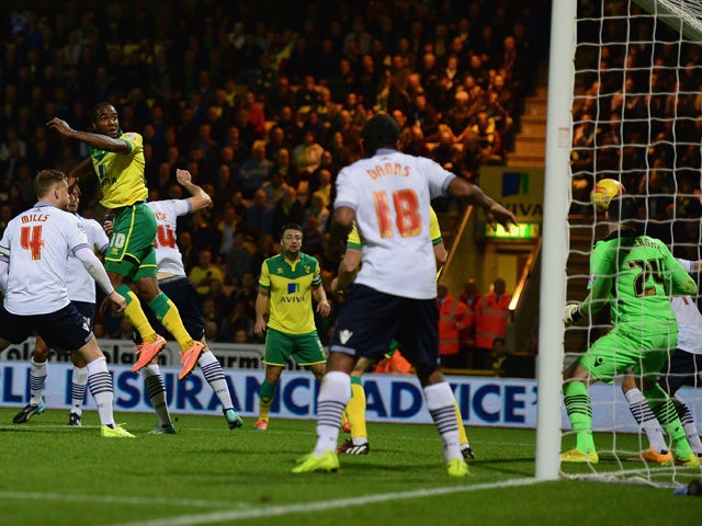 Cameron Jerome scores a goal for Norwich City during the Sky Bet Championship match between Norwich City and Bolton Wanderers at Carrow Road on October 31, 2014