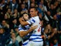 Charlie Austin of QPR celebrates scoring their second goal with Eduardo Vargas of QPR during the Barclays Premier League match between Queens Park Rangers and Aston Villa at Loftus Road on October 27, 2014