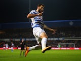 Charlie Austin of QPR celebrates scoring the opening goal during the Barclays Premier League match between Queens Park Rangers and Aston Villa at Loftus Road on October 27, 2014