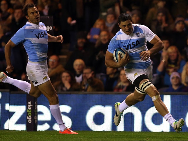 Argentina's flanker Javier Ortega Desio runs in to score the opening try of the Autumn International rugby union Test match between Scotland and Argentina at Murrayfield Stadium in Edinburgh, Scotland, on November 8, 2014