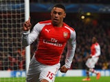 Alex Oxlade-Chamberlain of Arsenal celebrates as he scores their third goal during the UEFA Champions League Group D match between Arsenal FC and RSC Anderlecht at Emirates Stadium on November 4, 2014
