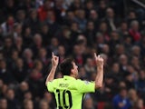 Barcelona's Argentinian forward Lionel Messi celebrates after scoring during the UEFA Champions League football match between Ajax Amsterdam and FC Barcelona in Amsterdam, November 5, 2014