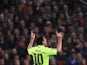 Barcelona's Argentinian forward Lionel Messi celebrates after scoring during the UEFA Champions League football match between Ajax Amsterdam and FC Barcelona in Amsterdam, November 5, 2014