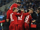 Bayer Leverkusen's football players celebrate a goal during their UEFA Champions League Group C football match between Bayer Leverkusen and Zenit at Petrovsky Stadium in St. Petersburg, Russia, on St. Petersburg on November 4, 2014