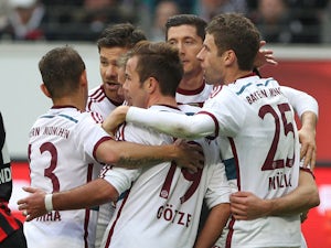 Muller nets hat-trick in Bayern triumph