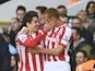 Bojan Krkic (L) of Stoke City celebrates with teammate Steve Sidwell of Stoke City after scoring the opening goal during the Barclays Premier League match against Spurs on November 9, 2014