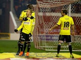 Alex Pritchard of Brentford celebrates scoring the third goal from the penalty spot during the Sky Bet Championship match between Nottingham Forest and Brentford at the City Ground on November 5, 2014