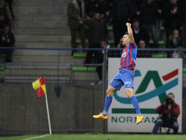 Caen's French forward Mathieu Duhamel celebrates after scoring a goal during the French L1 football match between Caen FC and FC Nantes at the Michel d'Ornano stadium in Caen, north-western France, on November 8, 2014