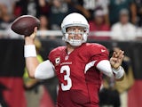 Quarterback Carson Palmer #3 of the Arizona Cardinals throws a pass against the Philadelphia Eagles in the second half of the NFL game at University of Phoenix Stadium on October 26, 2014