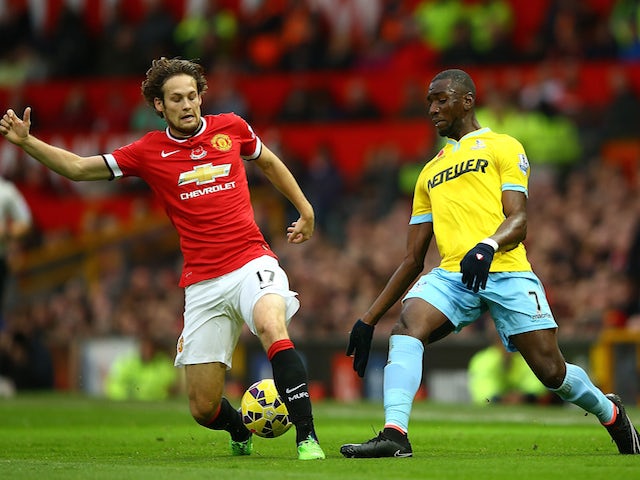 Daley Blind of Manchester United competes with Yannick Bolasie of Crystal Palace during the Barclays Premier League match on November 8, 2014