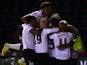 Jordon Ibe of Derby County is mobbed after scoring the first goal during the Sky Bet Championship match between Derby County and Huddersfield Town at iPro Stadium on November 4, 2014