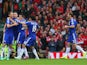 Gary Cahill of Chelsea celebrates with team mates after scoring their first goal during the Barclays Premier League match against Liverpool on November 8, 2014
