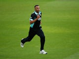 George Edwards of Surrey runs to stop a boundary during the Royal London One-Day Cup match between Surrey and Somerset at The Kia Oval on August 20, 2014