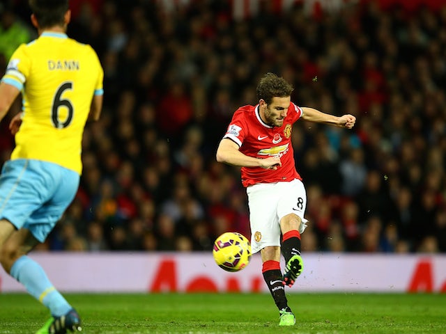 Juan Mata of Manchester United scores the first goal during the Barclays Premier League match against Crystal Palace on November 8, 2014