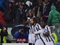 Juventus midfielder Andrea Pirlo celebrates after scoring a goal with Juventus french midfielder Paul Labile Pogba and Juventus midfielder of Ghana Kwadwo Asamoah during the UEFA Champions League Group A football match Juventus vs Olympiakos at the Juvent