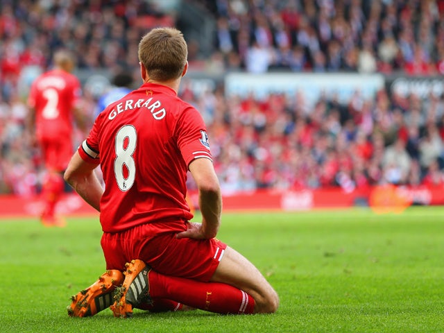 Steven Gerrard of Liverpool on his knees during the Barclays Premier League match between Liverpool and Chelsea at Anfield on April 27, 2014