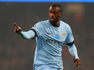 Girl collects signed Toure shirt after being hit by ball