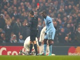 Yaya Toure of Manchester City is shown a red card by Referee Tasos Sidriopoulos during the UEFA Champions League Group E match between Manchester City and CSKA Moscow on November 5, 2014