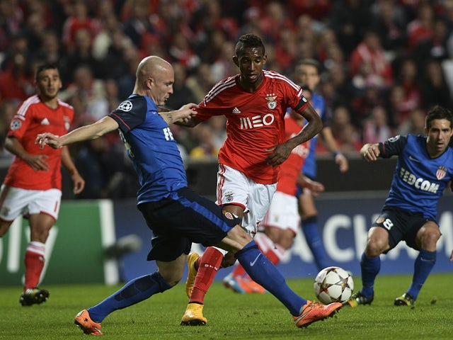 Monaco's Italian defender Andrea Raggi vies with Benfica's Brazilian forward Anderson Talisca during the UEFA Champions League group C football match between SL Benfica and AS Monaco FC at Luz stadium in Lisbon on November 4, 2014