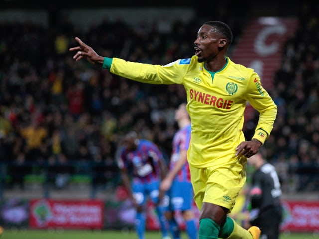 Nantes' Togolese forward Serge Gakpe celebrates after Nantes scored an equalizer during the French L1 football match Caen vs Nantes on November 8, 2014