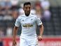 Neil Taylor of Swansea City in action during a pre season friendly match between Swansea City and Villarreal at Liberty Stadium on August 09, 2014