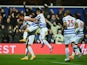 Charlie Austin of QPR celebrates with team mates as he scores their first goal during the Barclays Premier League match between Queens Park Rangers and Manchester City at Loftus Road on November 8, 2014