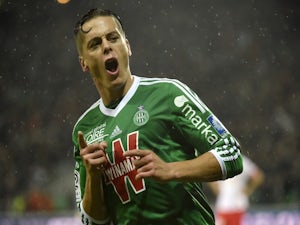 St Etienne's French midfielder Romain Hamouma reacts after scoring an equalizer during the French L1 football match Saint-Etienne (ASSE) vs Monaco (ASM) on November 9, 2014 