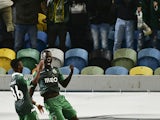 Sporting's French defender Mouhamadou Naby Sarr celebrates with his teammate forward Carlos Mane (L) after scoring during the UEFA Champions League football match Sporting Clube de Portugal vs FC Schalke 04 at the Jose Alvalade stadium in Lisbon on Novemb