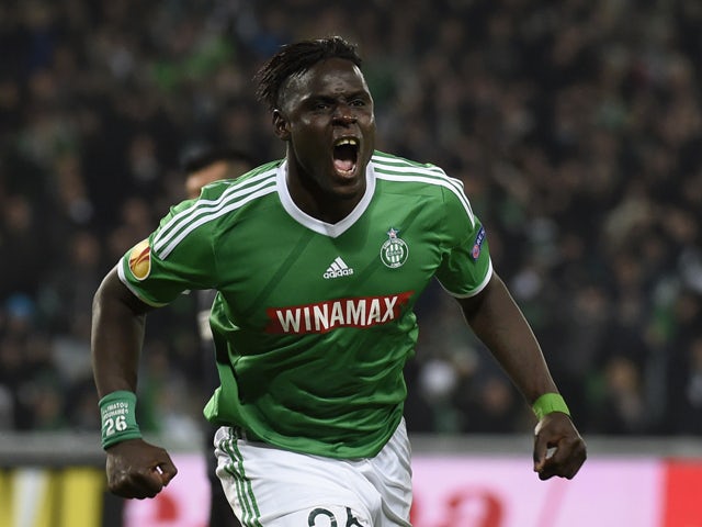 St Etienne's Senegalese defender Moustapha Bayal Sall reacts after scoring during the Europa League football match AS Saint-Etienne against FC Internazionale Milan on November 6, 2014