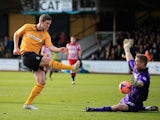 George Long of Sheffield United blocks a shot by Adam Cunnington of Cambridge United during the FA Cup Second Round match between Cambridge United and Sheffield United at the Abbey Stadium on December 8, 2013