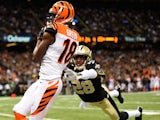 A.J. Green #18 of the Cincinnati Bengals catches a touchdown pass as Keenan Lewis #28 of the New Orleans Saints tries to defend on November 16, 2014