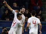Albania's defender Mergim Mavraj is congratuled by teammates after scoring a goal during during the friendly football match France vs Albania on November 14, 2014