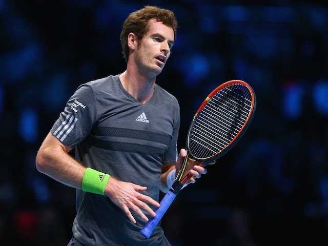 Andy Murray of Great Britain reacts n the round robin singles match against Roger Federer of Switzerland on day five of the Barclays ATP World Tour Finals on November 13, 2014
