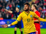 Brazil's forward Neymar celebrates after scoring a goal during a friendly football between Turkey and Brazil on November 12, 2014