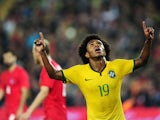 Brazil's forward Willian celebrates after scoring a goal during a friendly football between Turkey and Brazil on November 12, 2014