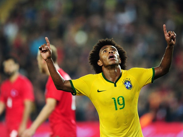 Brazil's forward Willian celebrates after scoring a goal during a friendly football between Turkey and Brazil on November 12, 2014